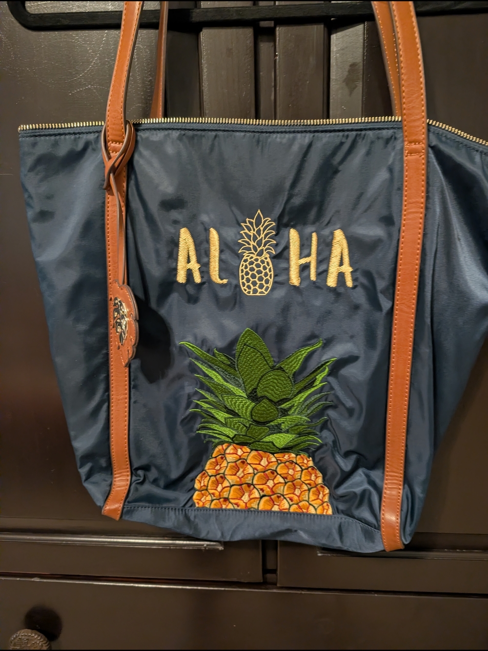 Tommy Bahama Navy Tote with Pineapple Embroidery and Brown Trim
